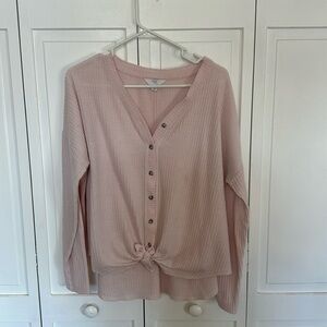 Casual pink top with fun waistline